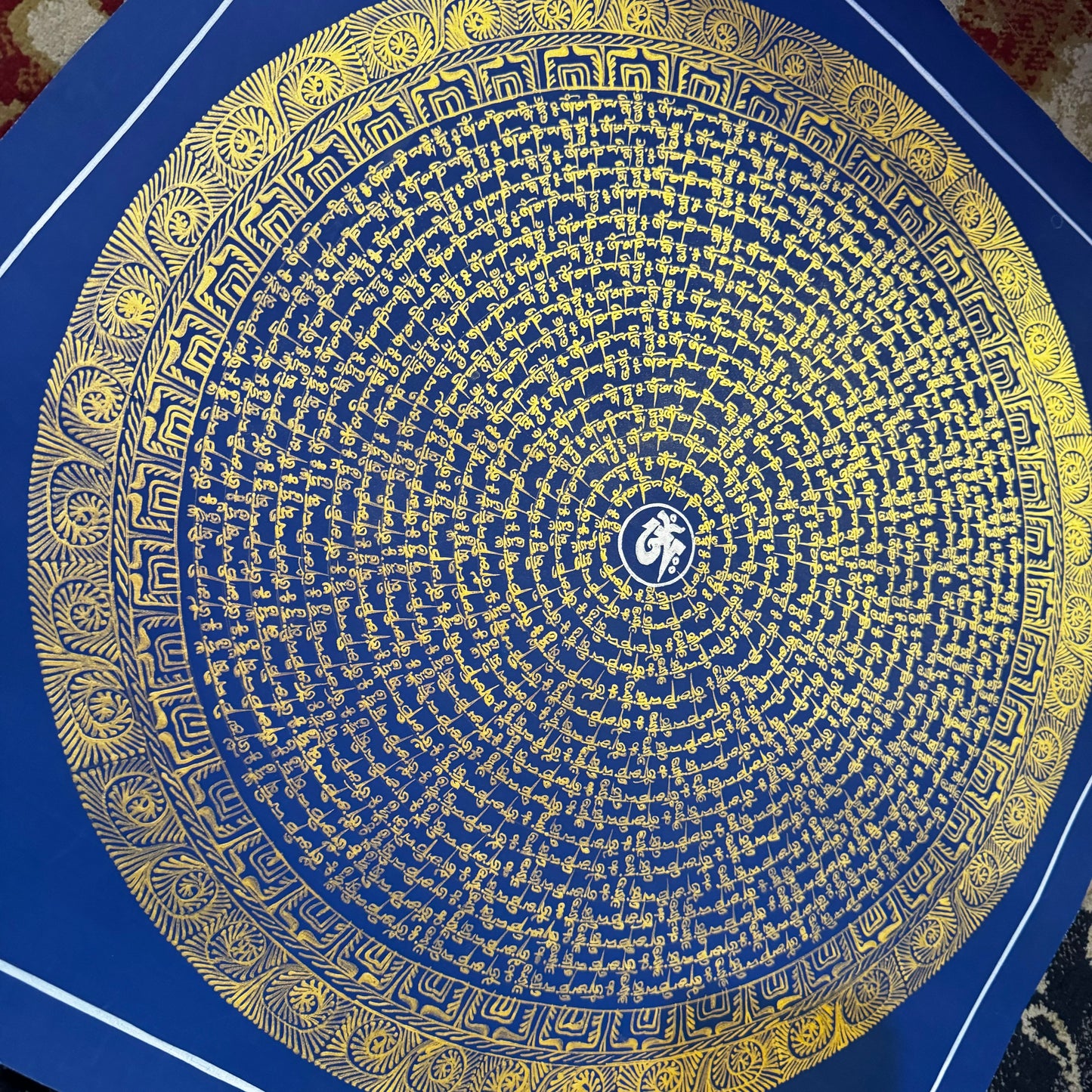 Beautiful Mantra Mandala with Blue Background