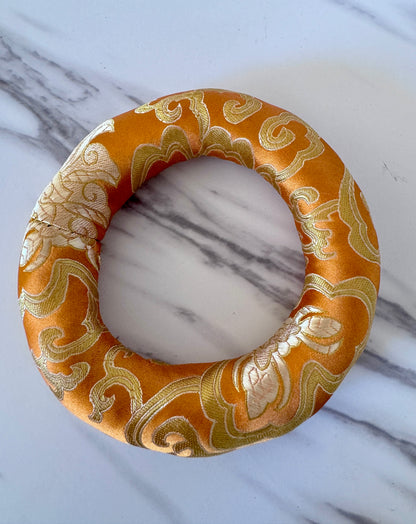 Orange Singing Bowl Ring Cushion