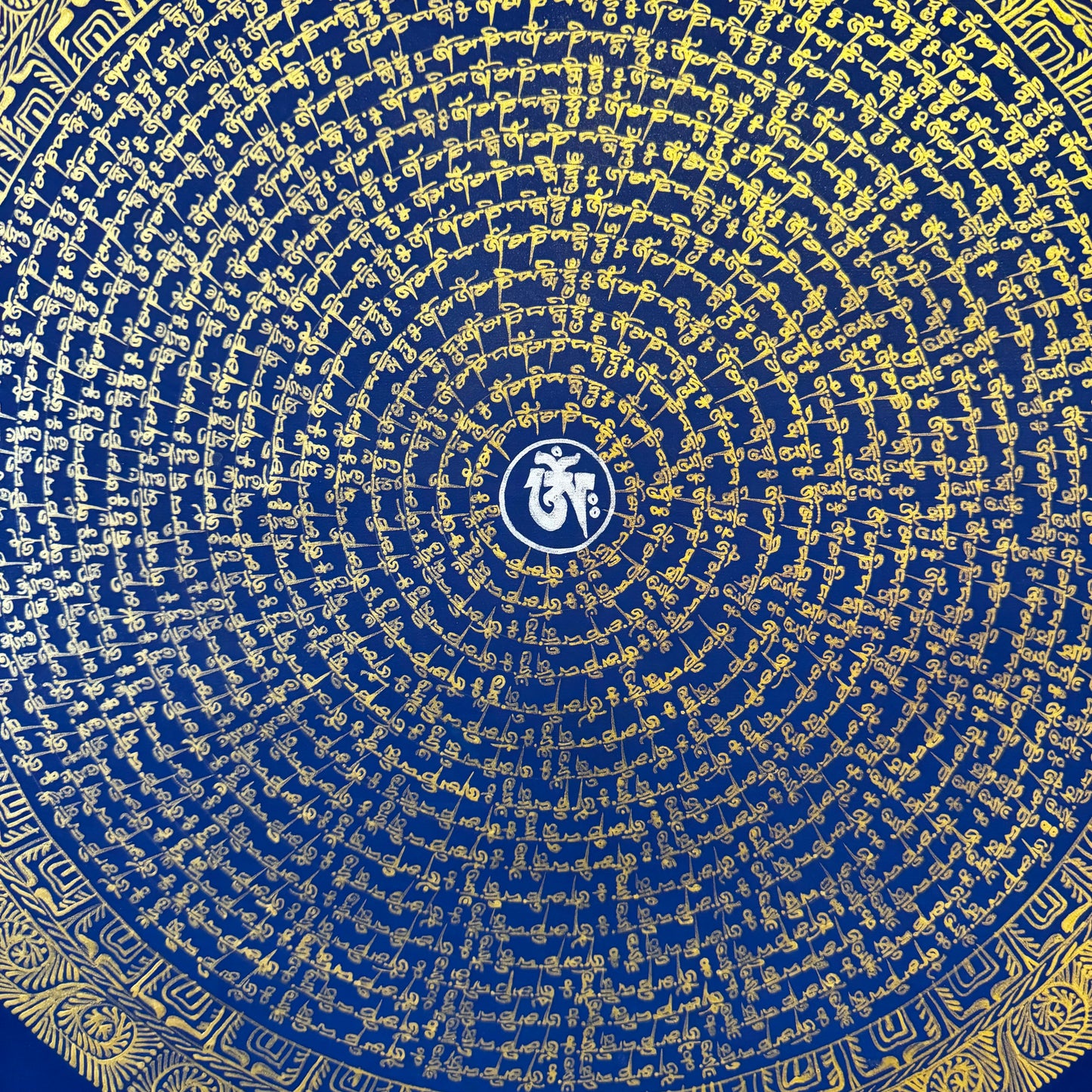 Beautiful Mantra Mandala with Blue Background